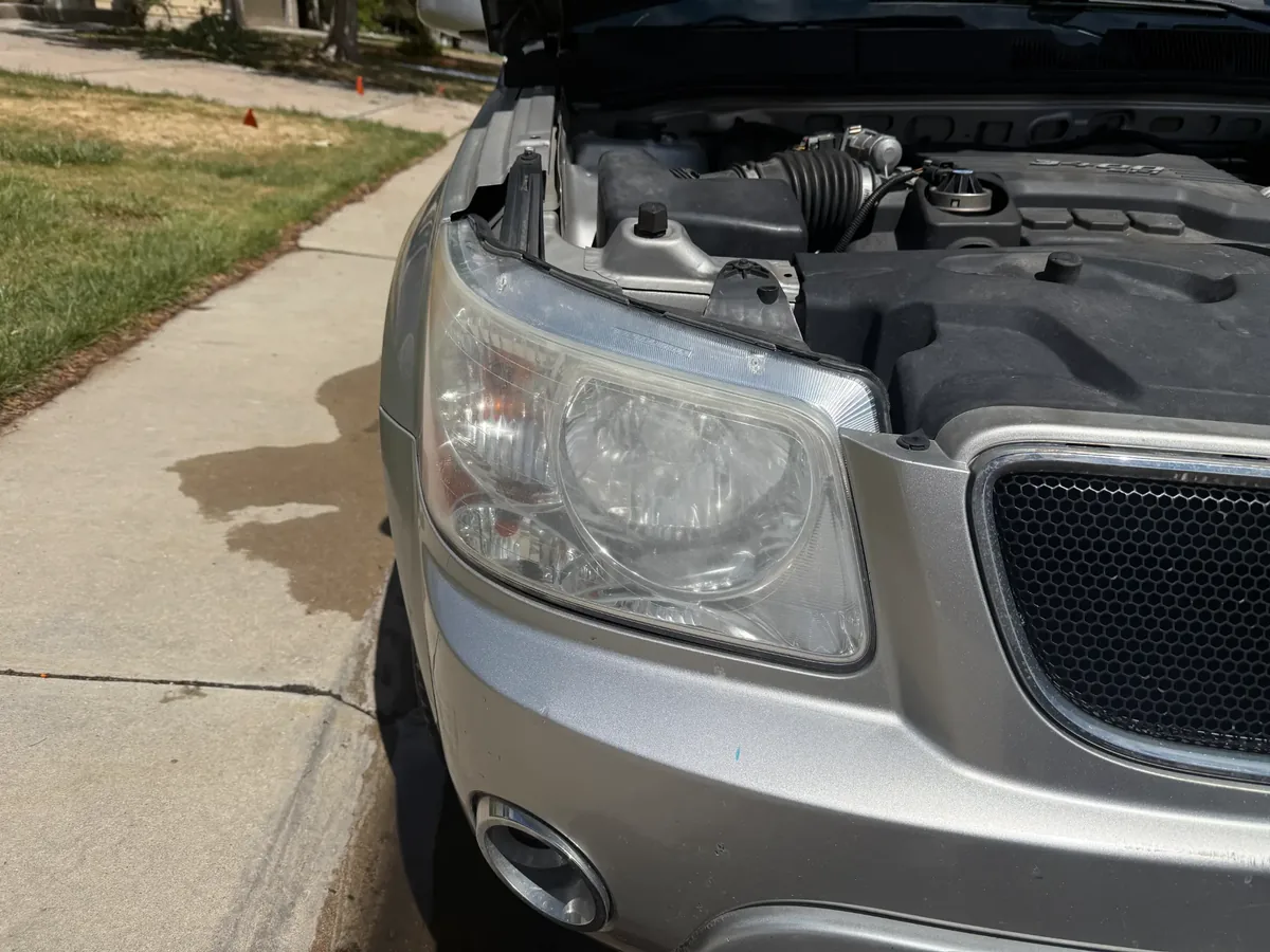 Featured Result cloudy yellowed oxidized headlights before restoration, Denver Metro, CO, Headlight Boost