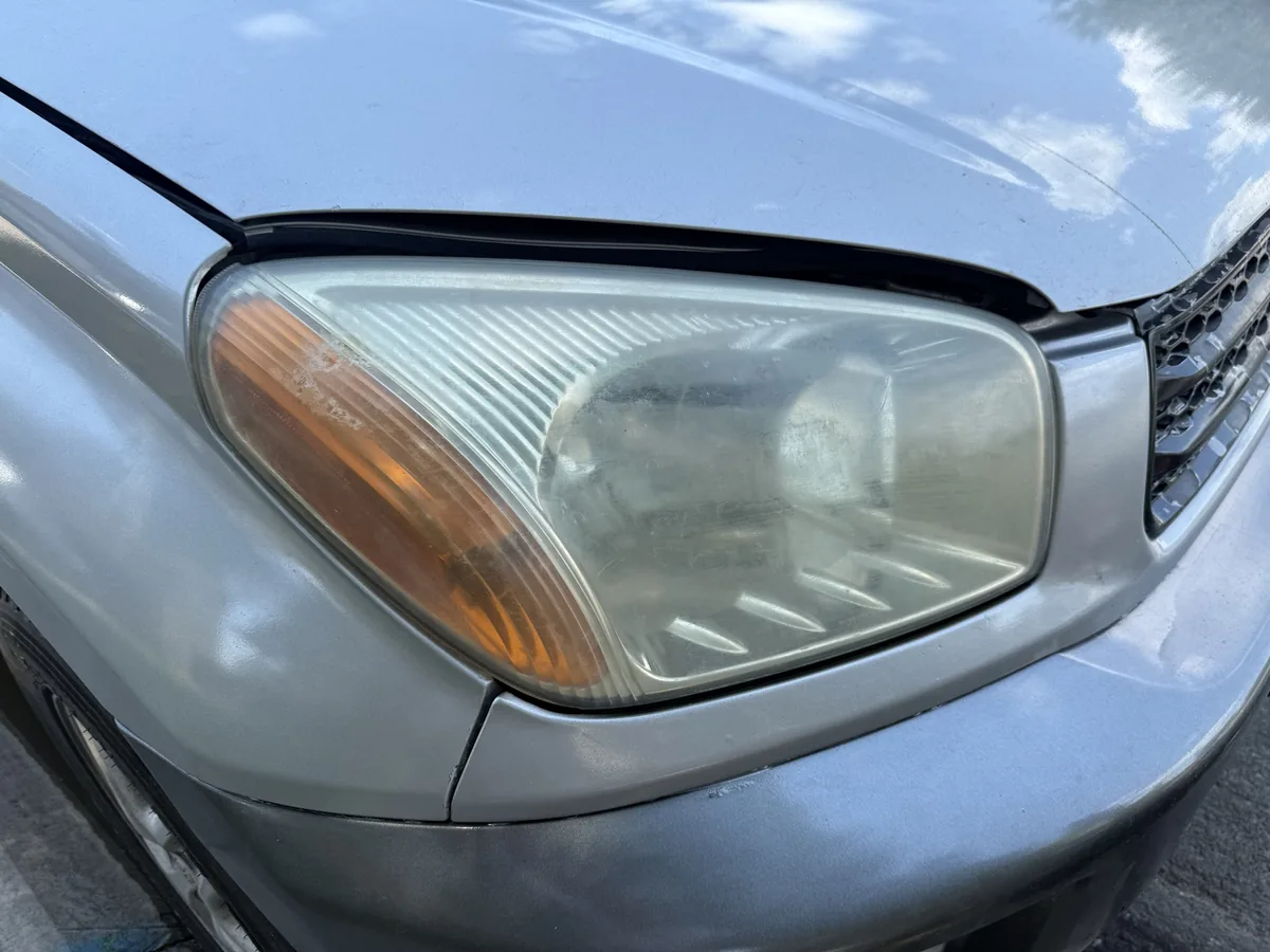 Toyota RAV4 cloudy yellowed oxidized headlights before restoration, Denver Metro, CO, Headlight Boost